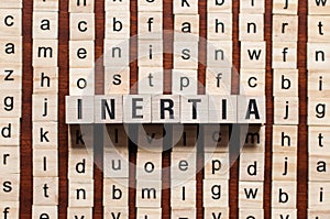 Inertia word concept photo