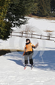 Inexperienced boy trying the cross-country skiing and then he f