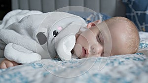 infancy, childhood, development, medicine and health concept - close-up face of sweaty newborn chubby sleeping baby 10