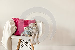 Infant accessories on white chair