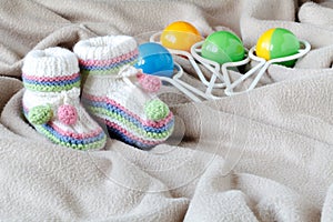 Infant anouncement concept with newborn shoes