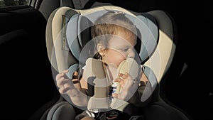 Infant baby girl in car seat