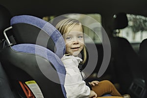 Infant baby girl in car seat ready to go