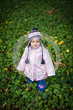 Infant baby girl in park