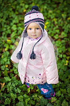 Infant baby girl in park