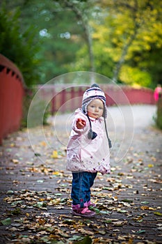 Infant baby girl in park