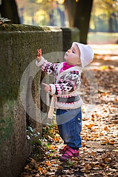 Infant baby girl in park