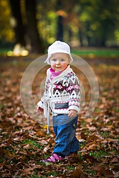 Infant baby girl in park