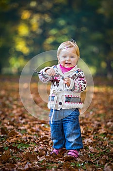 Infant baby girl in park