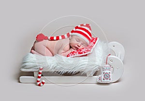 Infant baby sleeping on wooden crib