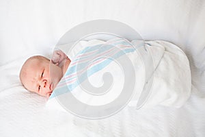 Infant Baby Swaddled in Hospital Blanket