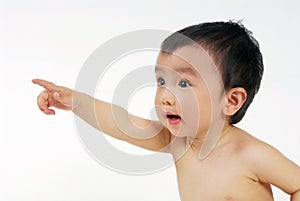 Infant boy pointing