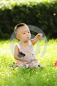 Infant boy pointing
