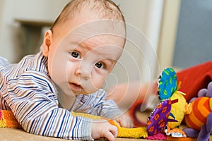 Infant Boy with Toys