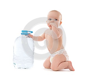 Infant child baby girl sitting with big bottle of drinking water