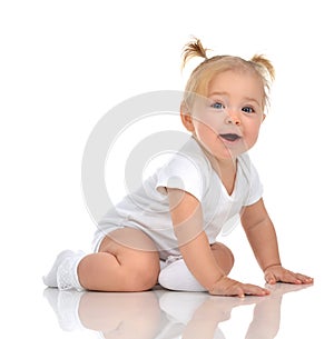 Infant child baby girl toddler crawling happy looking straight