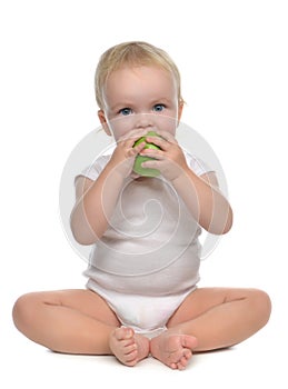 Infant child baby infant girl eating apple