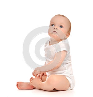 Infant child baby toddler sitting crawling looking up happy smiling
