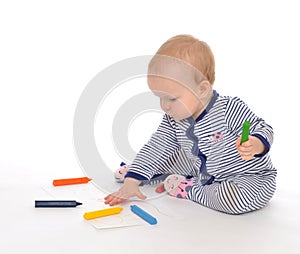 Infant child baby toddler sitting drawing painting with color pe