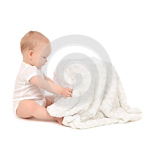 Infant child baby toddler sitting and open soft blanket towel