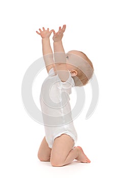 Infant child baby toddler sitting raise hands up