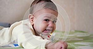 infant, childhood concept - close-up of crying Baby plays with a teether. Teeth cutting. First teeth. Joy toothless 7