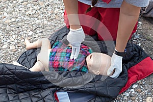 Infant dummy first aid. CPR.