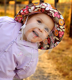 Infant girl goofing around