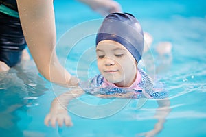 Infant learning to swim