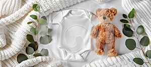 Infant onesie mockup with teddy bear and eucalyptus on ivory blanket baby clothing template