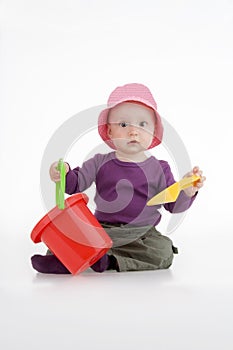 Infant with pail photo