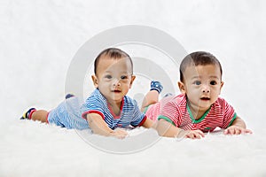 Infant twins sleeping.Newborn Babies Twins Sleep in Bed.