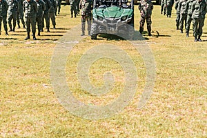 Infantry troops and war vehicles formed into squads