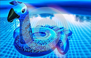 Infatable peacock in the pool