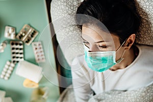 Infected woman with mask in mobile quarantine hospital units isolation.Coronavirus patient having pneumonia disease symptoms.