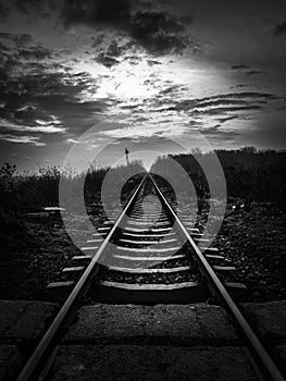 Infinite infinity railway to the horizon in black and white