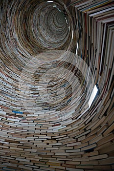 Infinite tunnel of books, also called an endless tower, book tower in the public library of Prague