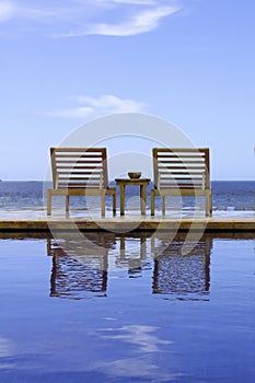 Infinity pool with chairs