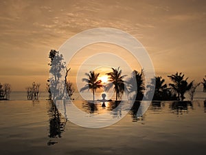 Infinity Pool Facing Beautiful Sunset