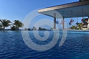 Infinity pool with swim up bar