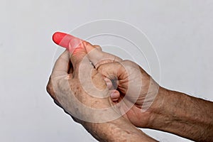 Inflammation in fingertip of Asian man. Concept of cellulitis and finger problems photo