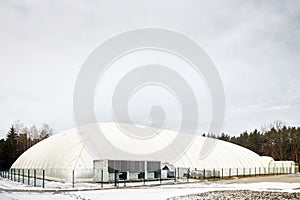 Inflatable air dome stadium. Inflated Football soccer air dome. Modern architecture example pneumatic stadium dome with