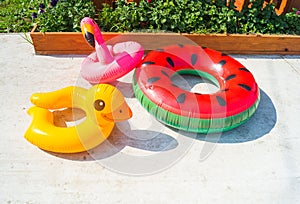 Inflatable children circles lie on the street