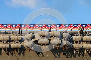 Inflatable lifeboat capsules on a retired aircraft carrier ship