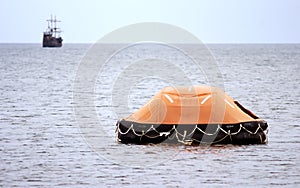 Inflatable lifeboat at sea photo