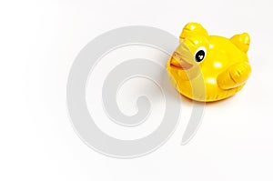 Inflatable mini yellow chicken or duckling on white background, pool float party. Flat lay copy space. Trend Inflatable Children