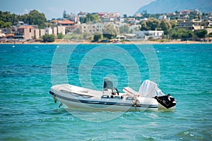 Inflatable motor boat on sea.