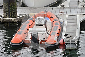 Inflatable motor boats moored at the pier