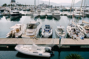 Inflatable motor boats and yachts at the marina. Porto, Montenegro