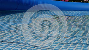 Inflatable Paddling family pool in garden medium